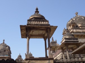 Cupolas and intricately carved sandstone jalis